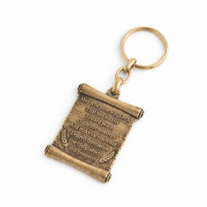 Um chaveiro exclusivo com a bênção da estrada em inglês e um chip da Bíblia